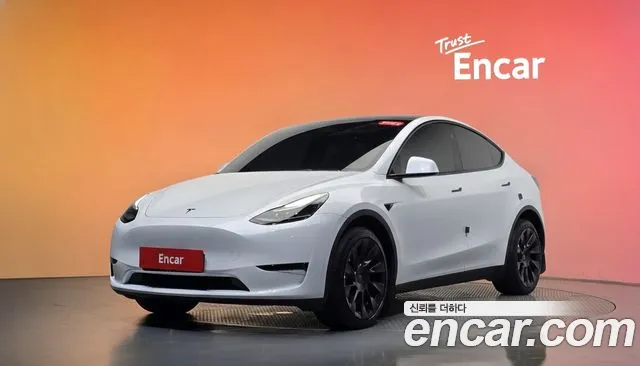 Tesla Model Y 2024 — photo 1