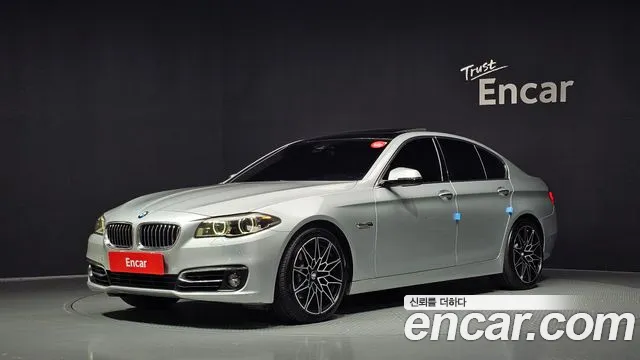 BMW 5-Series 2014 — photo 1
