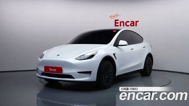Tesla Model Y 2024 — photo 1
