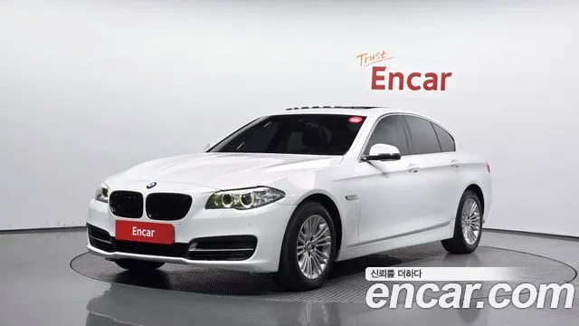 BMW 5-Series 2014 — photo 1