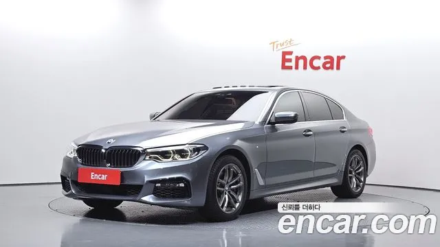 BMW 5-Series 2018 — photo 1