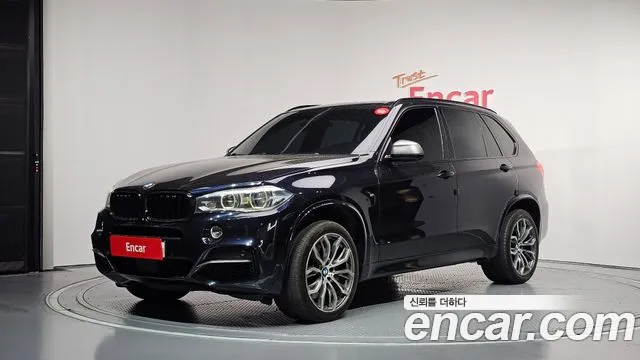 BMW X5 2014 — photo 1