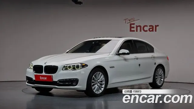 BMW 5-Series 2014 — photo 1