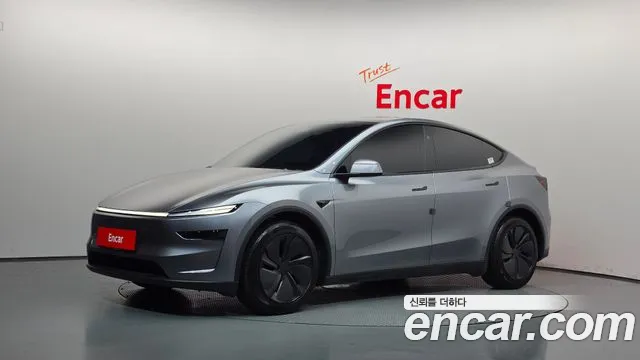 Tesla Model Y 2025 — photo 1