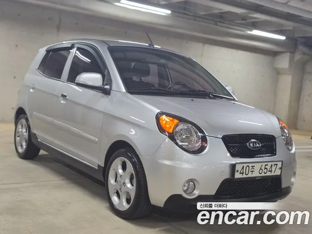 Kia morning 2011 — photo 1