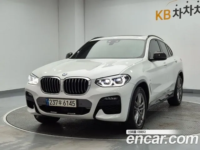 BMW X4 2021 — photo 1