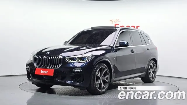 BMW X5 2021 — photo 1