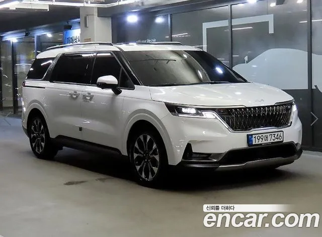 Kia Canival 2023 — photo 1