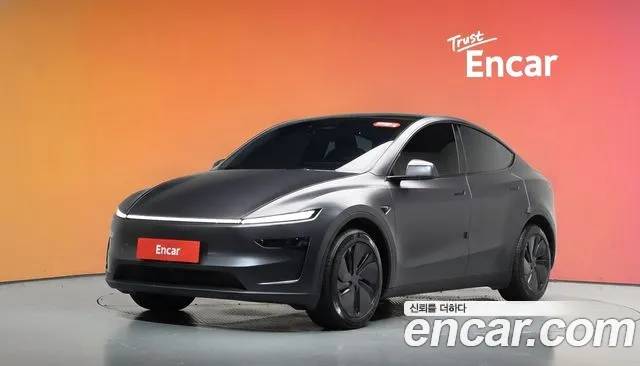 Tesla Model Y 2025 — photo 1