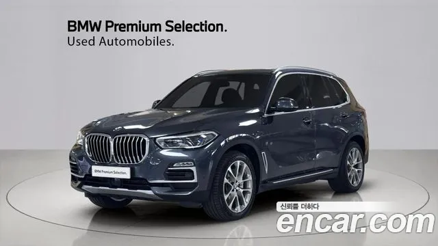 BMW X5 2021 — photo 1