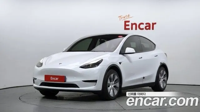 Tesla Model Y 2024 — photo 1