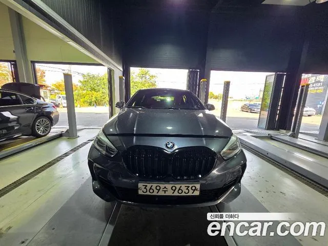 BMW 1-Series 2021 — photo 1