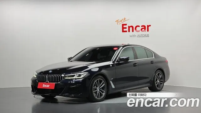 BMW 5-Series 2023 — photo 1