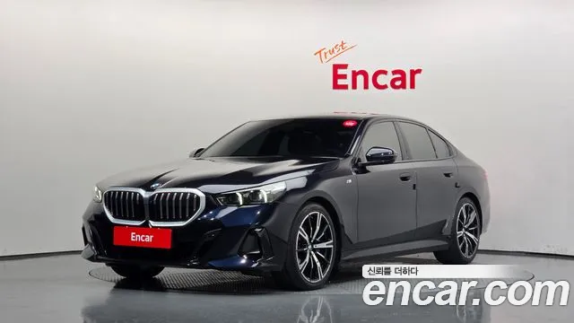 BMW 5-Series 2024 — photo 1