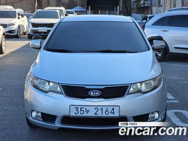 Kia Porte 2012 — photo 1