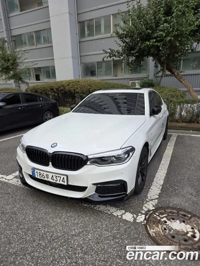 BMW 5-Series 2018 — photo 1