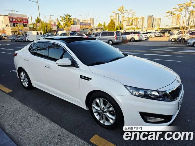 Kia K5 2011 — photo 1