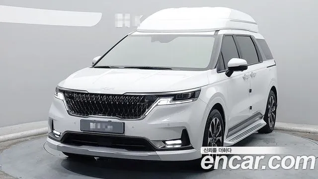 Kia Canival 2023 — photo 1