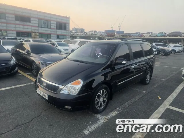 Kia Canival 2013 — photo 1