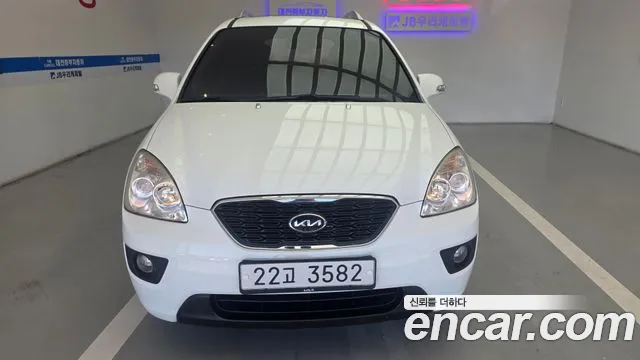 Kia Carens 2011 — photo 1