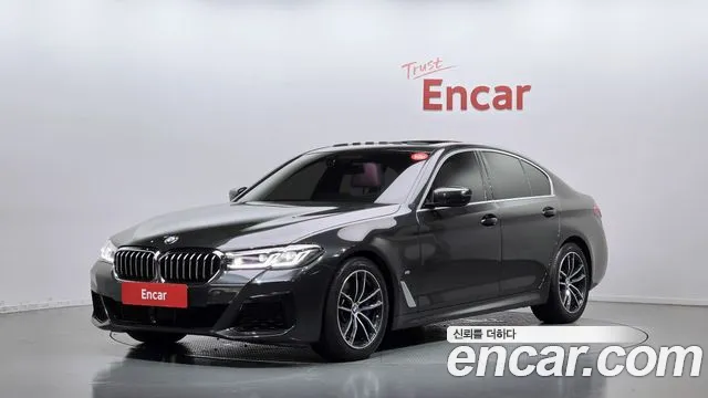BMW 5-Series 2022 — photo 1