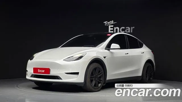 Tesla Model Y 2024 — photo 1