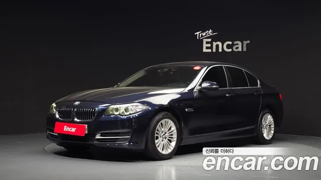 BMW 5-Series 2015 — photo 1