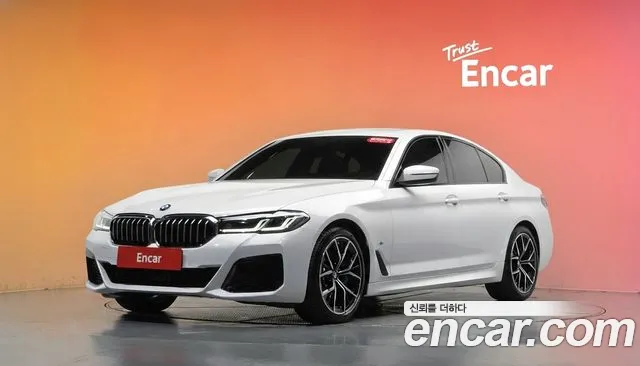 BMW 5-Series 2023 — photo 1