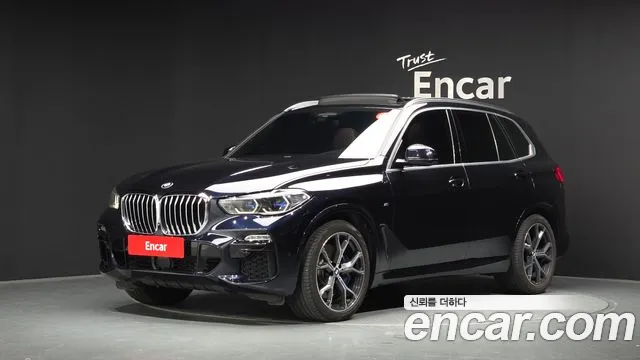 BMW X5 2021 — photo 1