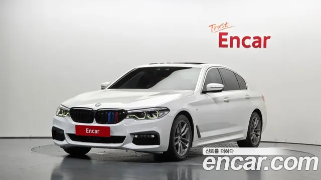 BMW 5-Series 2018 — photo 1