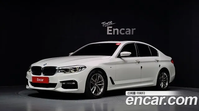 BMW 5-Series 2018 — photo 1