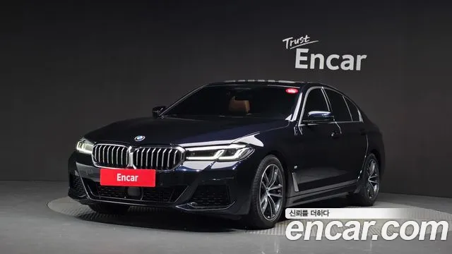 BMW 5-Series 2023 — photo 1