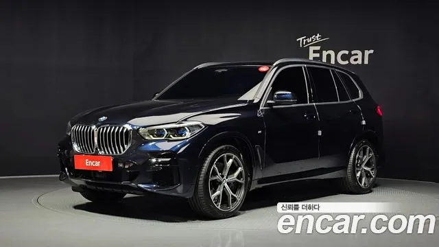 BMW X5 2022 — photo 1