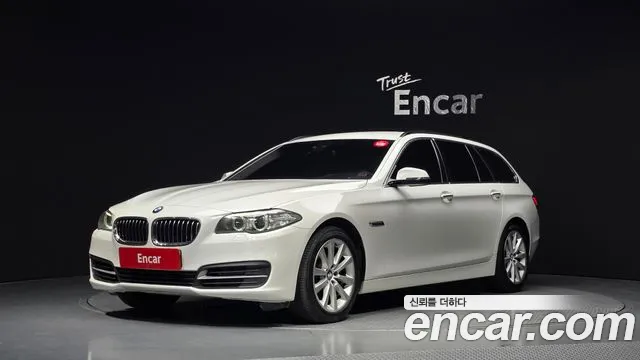 BMW 5-Series 2015 — photo 1
