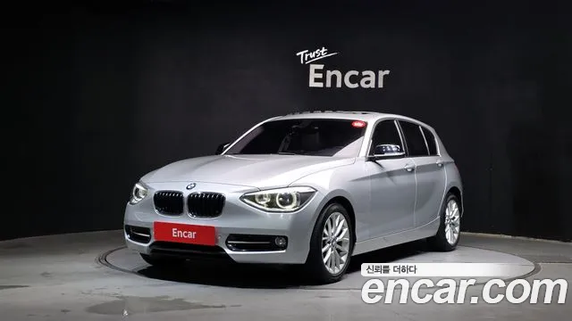 BMW 1-Series 2015 — photo 1