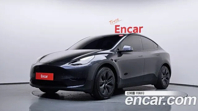 Tesla Model Y 2024 — photo 1