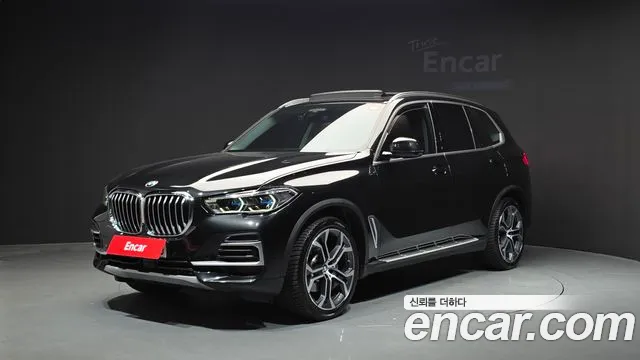 BMW X5 2022 — photo 1