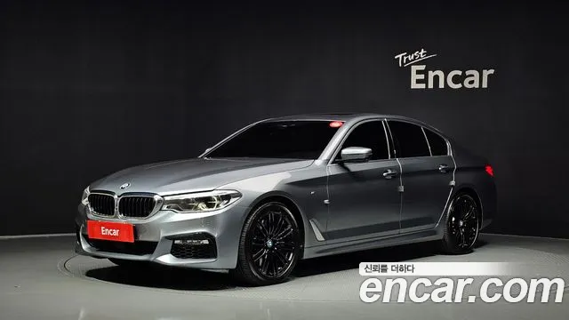 BMW 5-Series 2018 — photo 1