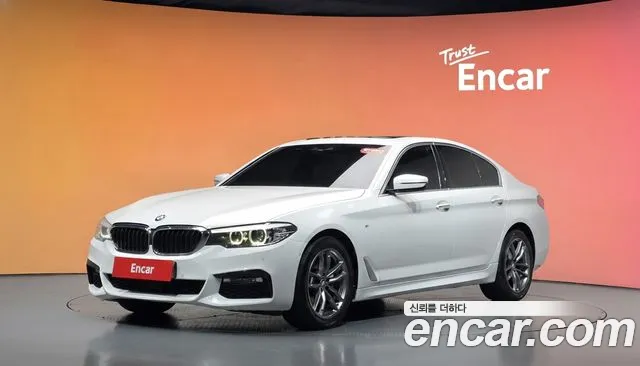 BMW 5-Series 2018 — photo 1