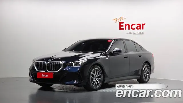 BMW 5-Series 2024 — photo 1
