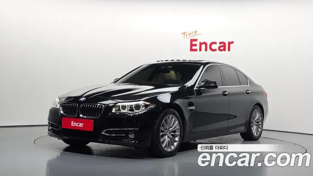 BMW 5-Series 2015 — photo 1