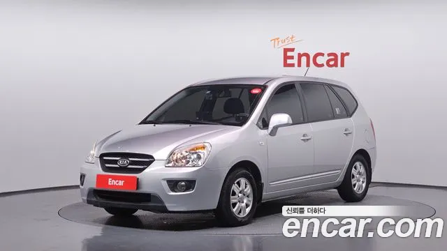 Kia Carens 2010 — photo 1