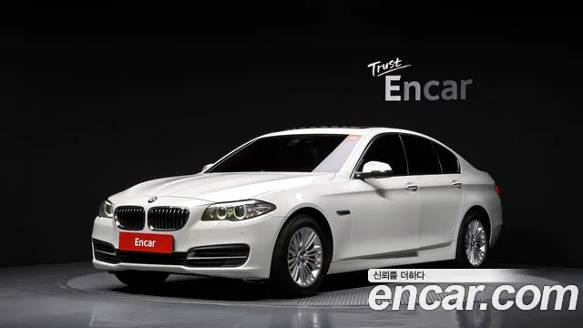 BMW 5-Series 2015 — photo 1