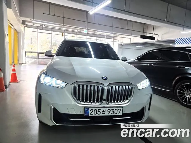 BMW X5 2024 — photo 1