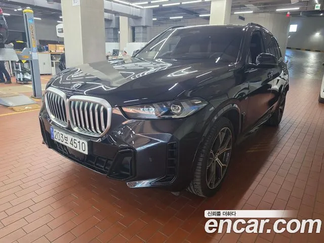 BMW X5 2024 — photo 1