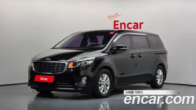 Kia Canival 2015 — photo 1