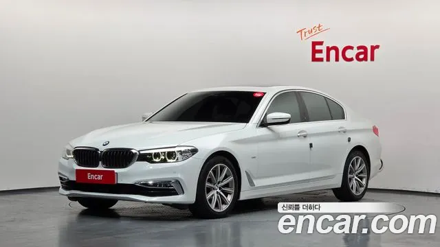 BMW 5-Series 2018 — photo 1