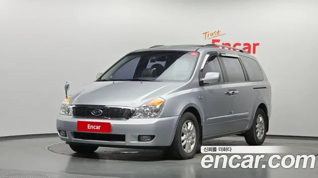 Kia Canival 2010 — photo 1
