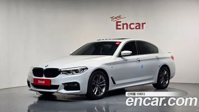 BMW 5-Series 2018 — photo 1