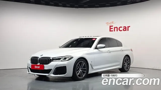 BMW 5-Series 2023 — photo 1